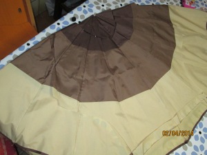 La stoffa da ombrello prima del taglio